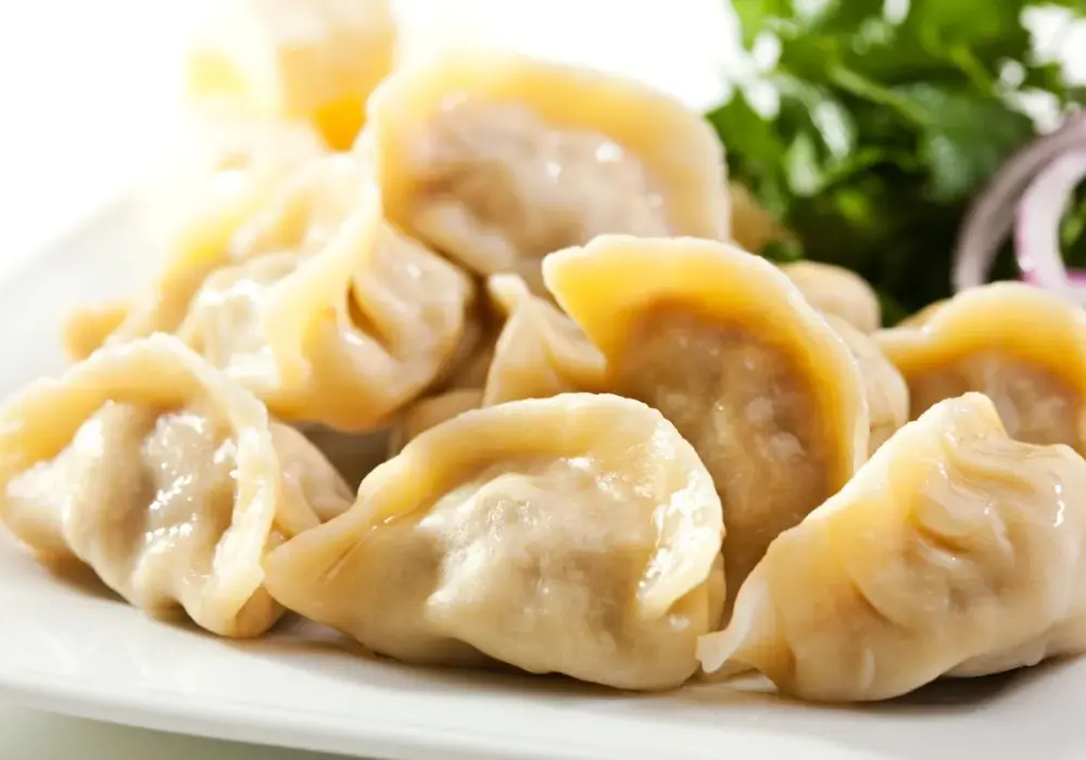 Pierogi z kapustą - jak zrobić idealne ciasto i farsz bez pęknięć?